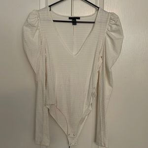 White patterned body suit with puffy shoulders